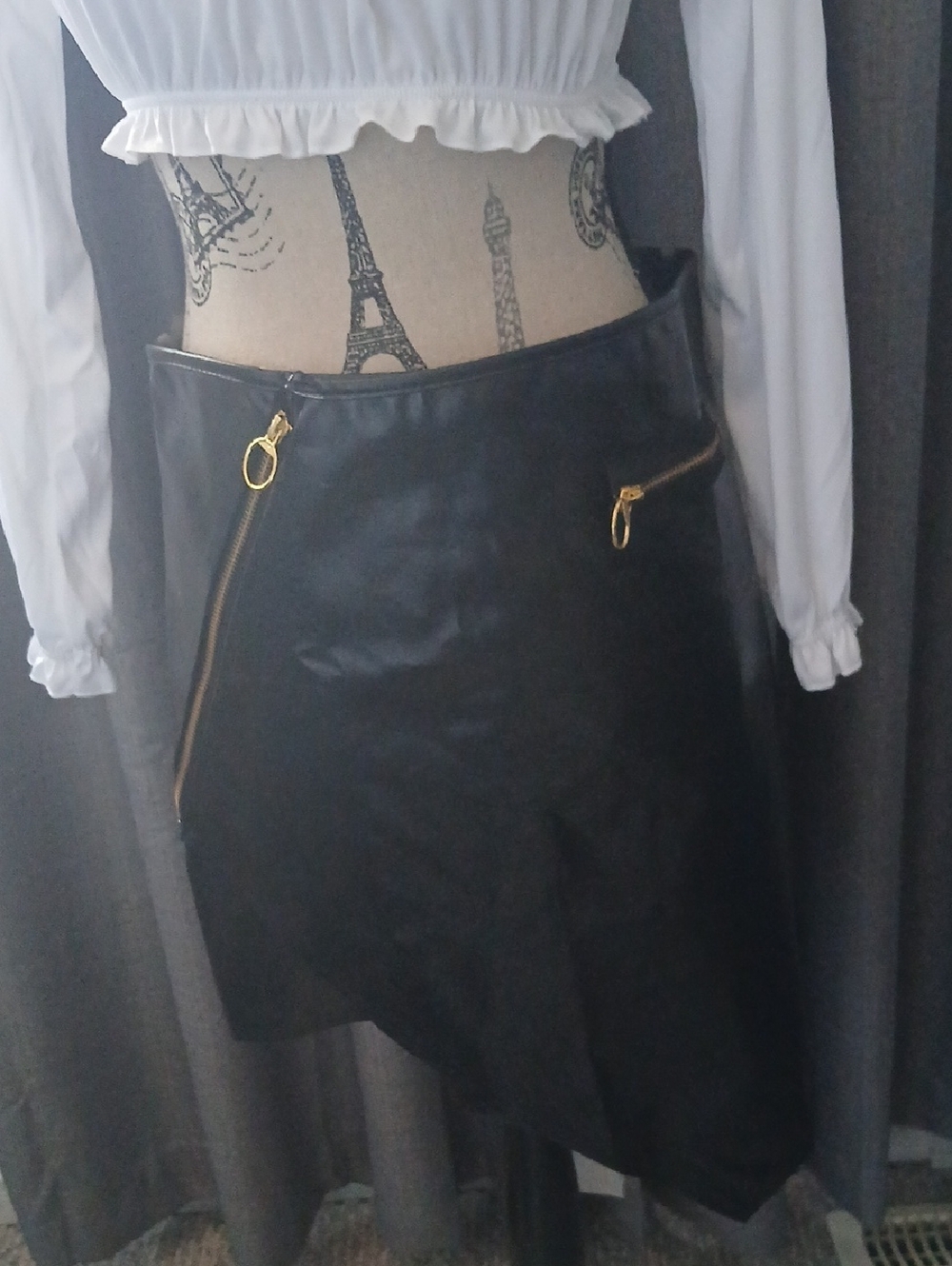 Black Faux Leather Asymmetrical Skirt with Gold Zipper Details